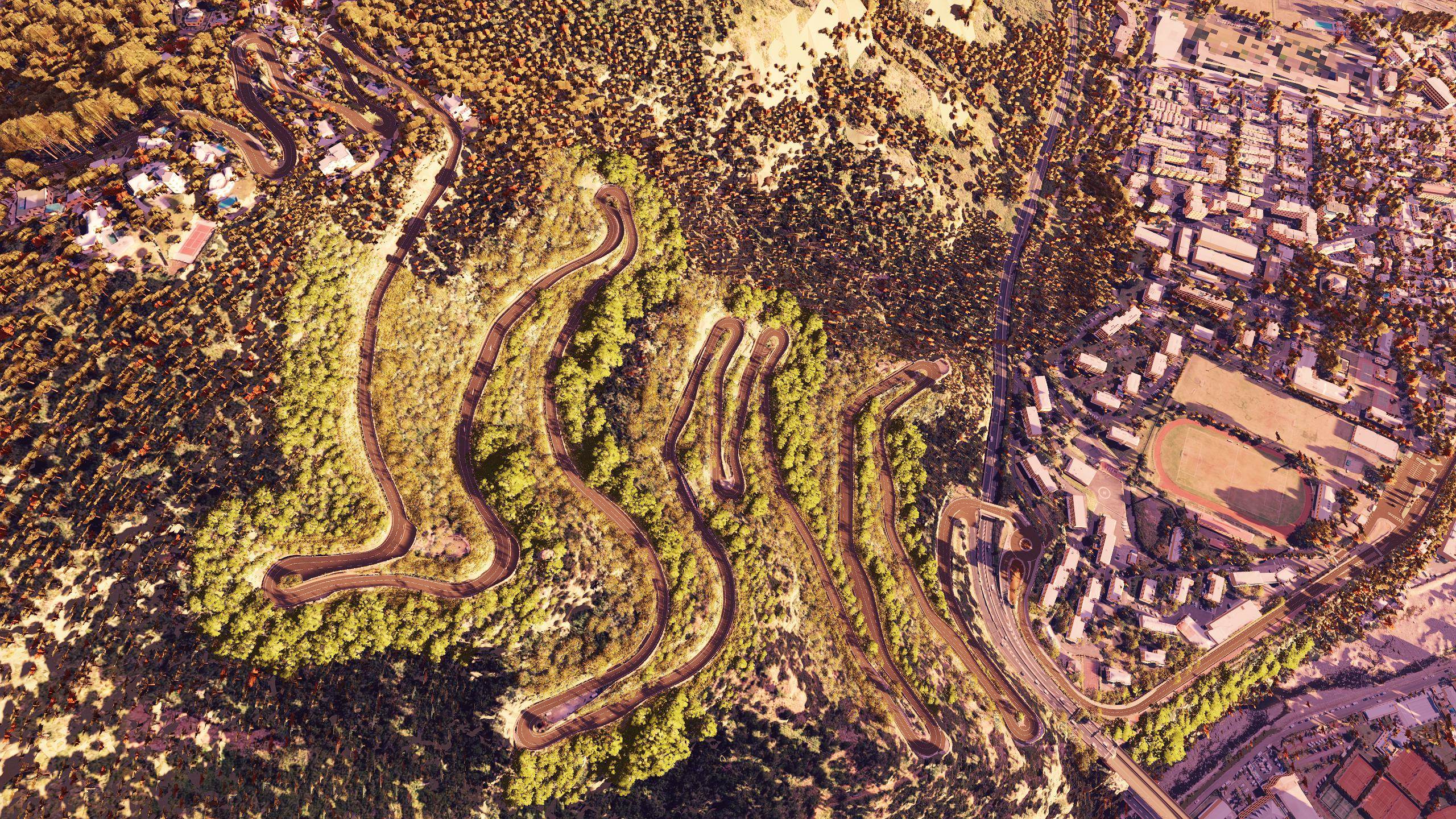 Les lacets de la route de la Montagne vus du ciel, au-dessus de Saint-Denis, dans Assetto Corsa